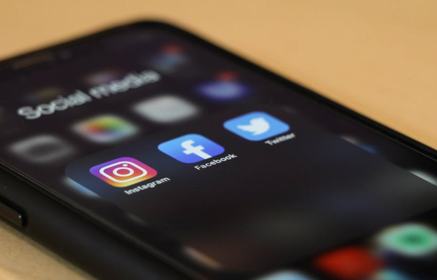 Three Social Media Icons on a Phone Screen