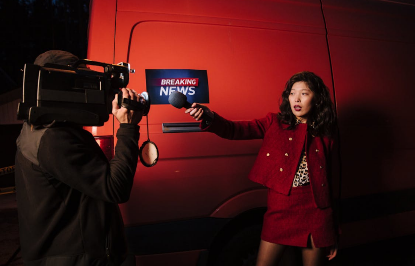A female reporter broadcasting news