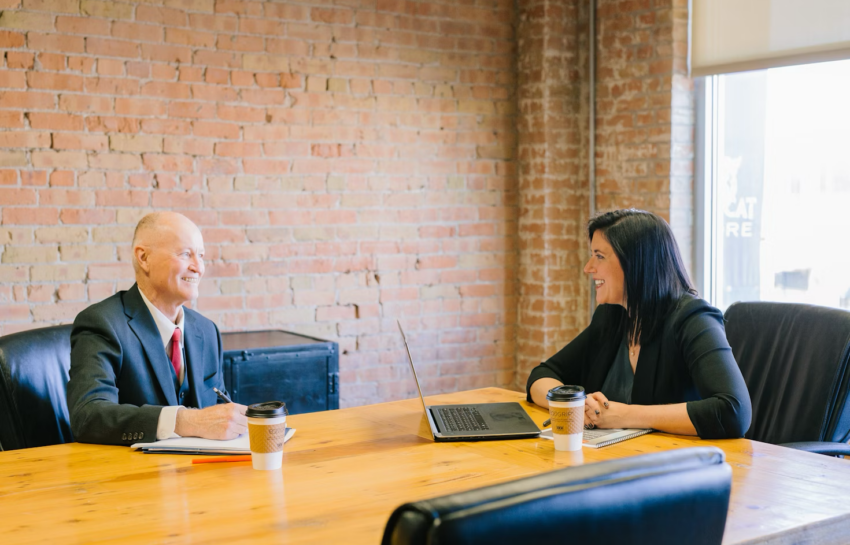 Two TV news agents meeting in an office by https://unsplash.com/photos/man-and-woman-talking-inside-office-W7aXY5F2pBo